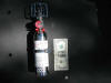 Extinguisher with dollar.jpg (39879 bytes)